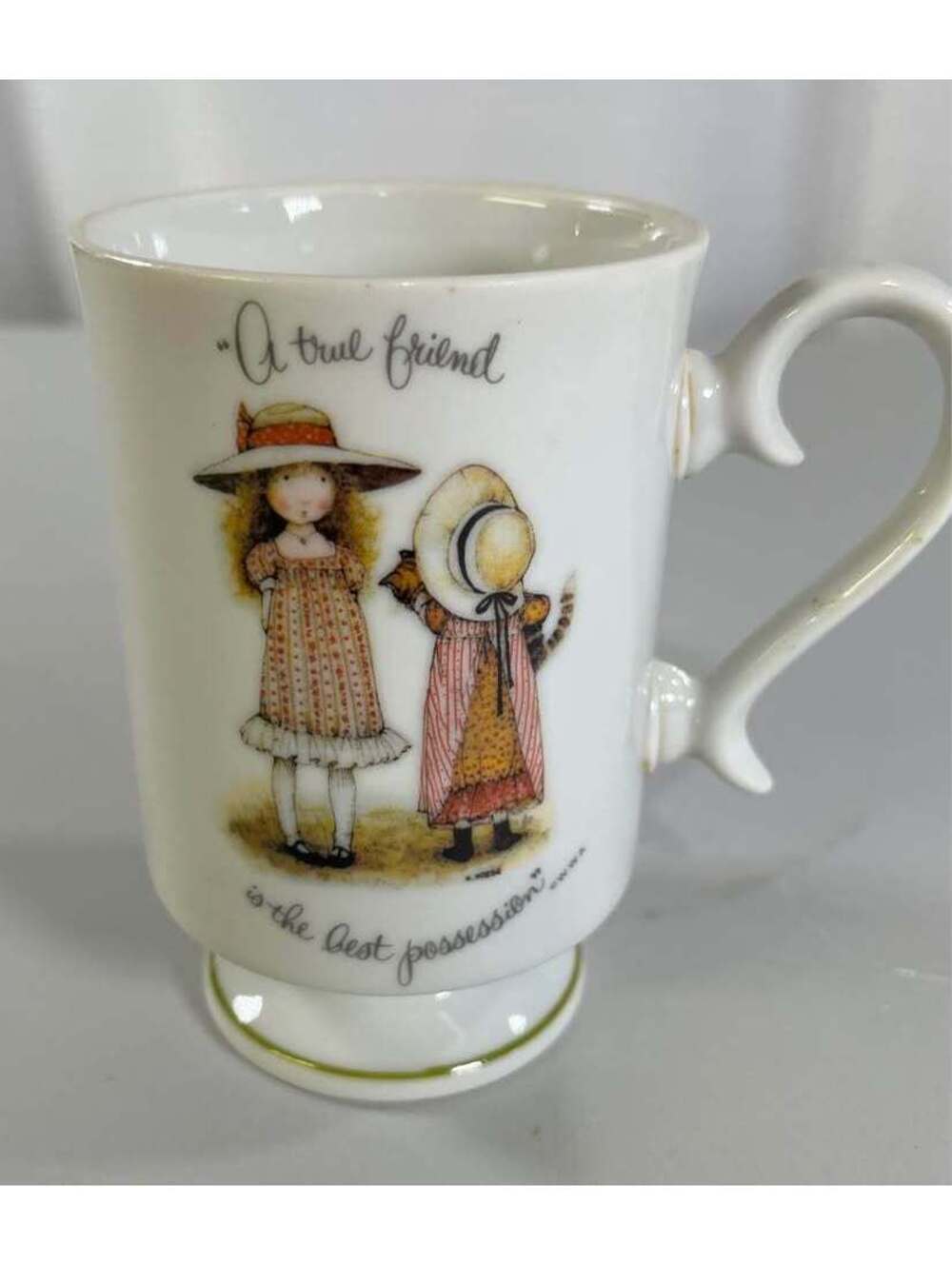 Vintage 1973 Holly Hobbie porcelain pedestal coffee mug